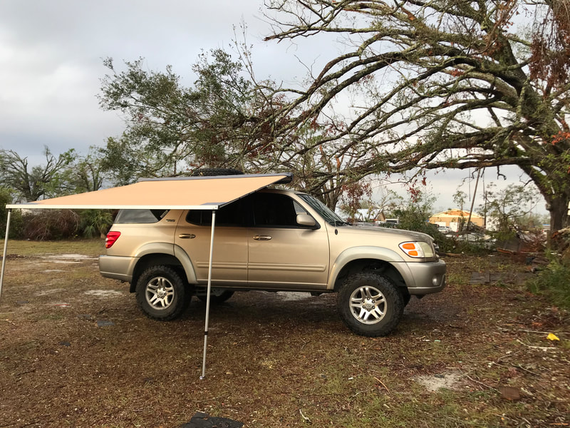 ARB Awning on gold first generation Toyota Sequoia